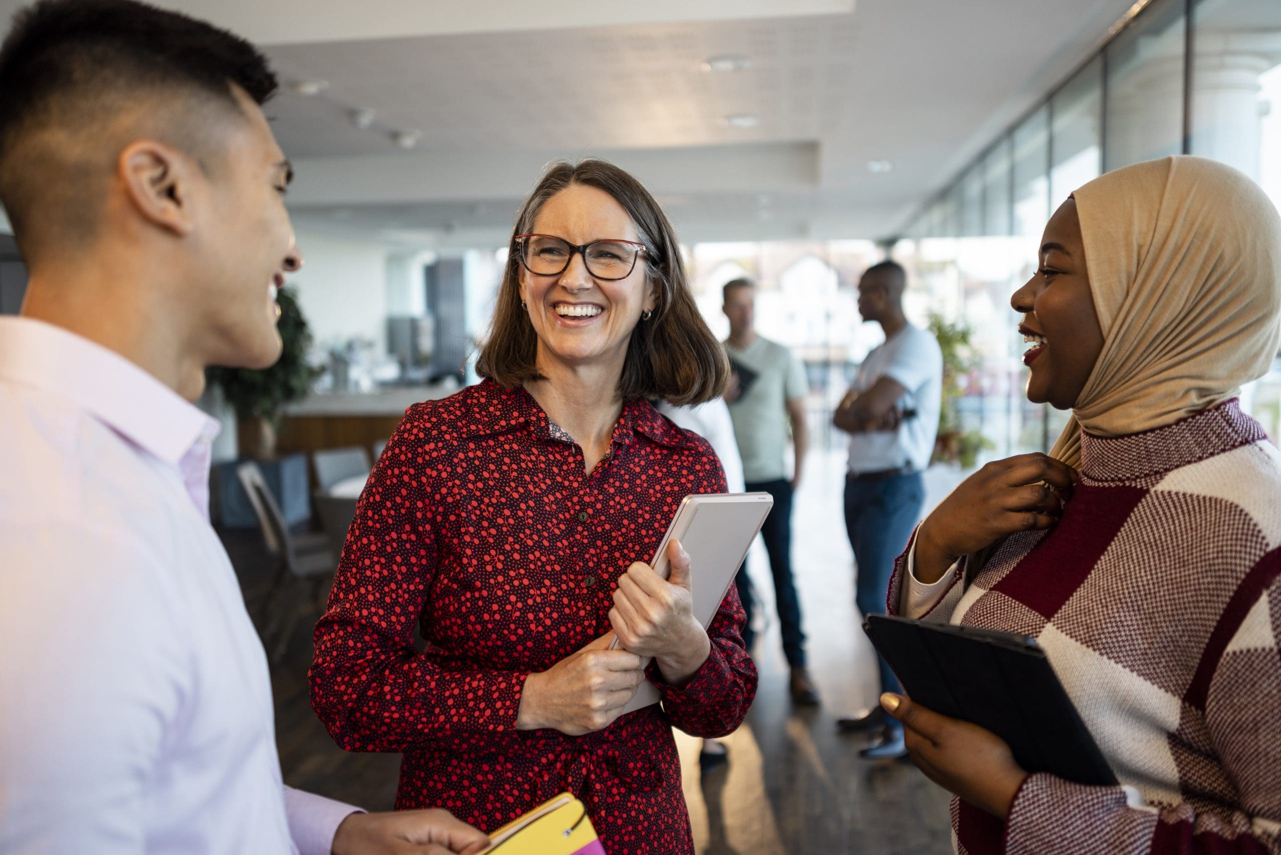 Cloud security professionals in conversation at a community event